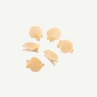 Simpukkaklipsit beige