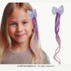 Perhoshiusklipsi violetilla hiuspidennyksellä